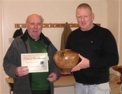 The monthly winner Pat Hughes received his certificate from Tony Handford